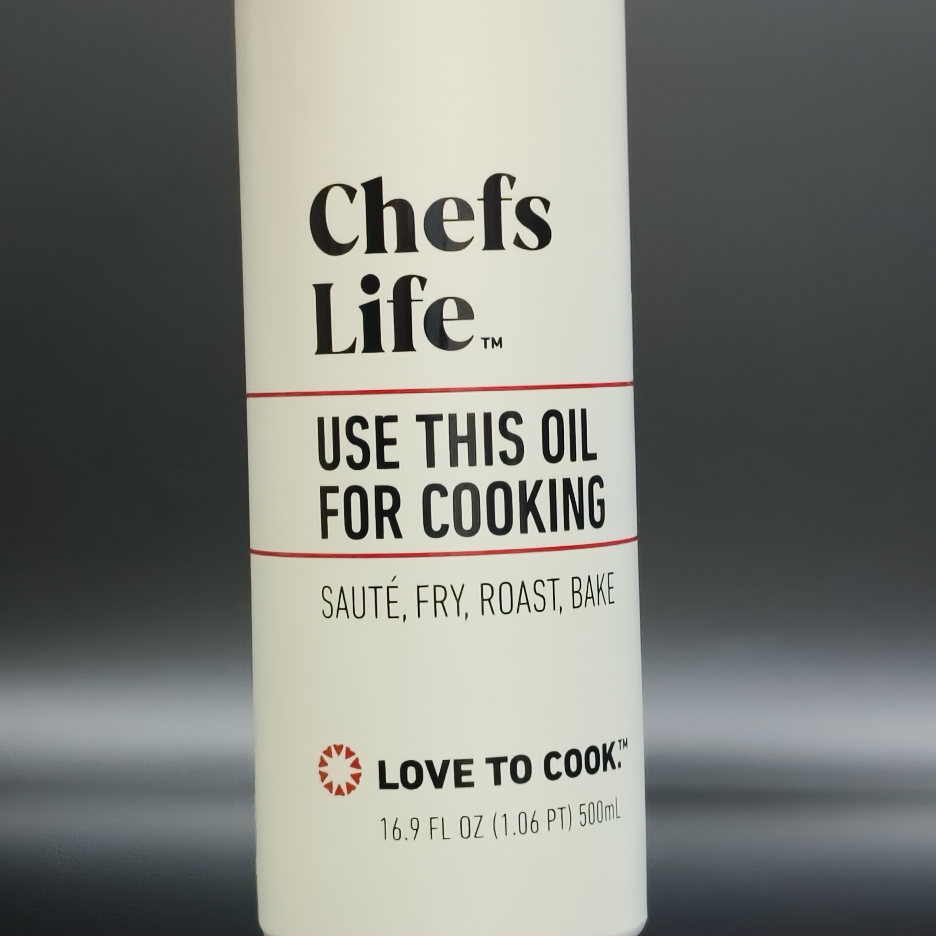 Close-up of organic screen printing on a custom glass liquor bottle